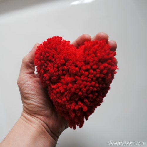 This Valentine's Pom Pom Heart Bunting is so cute! It's really unique and so fun to make. Visit cleverbloom.com for a tutorial with lots of step by step pictures.