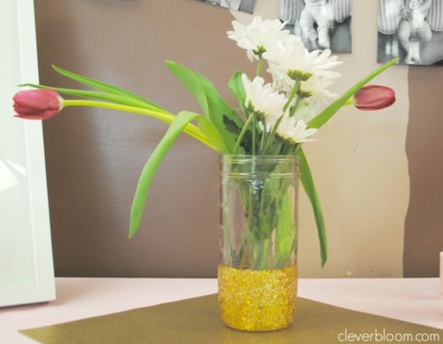 These DIY Gold Glitter Mason Jars are perfect to spice up any occasion. Visit cleverbloom.com for a step by step tutorial with lots of pictures to help you along. Don't waste your money on high end vases when you can DIY!